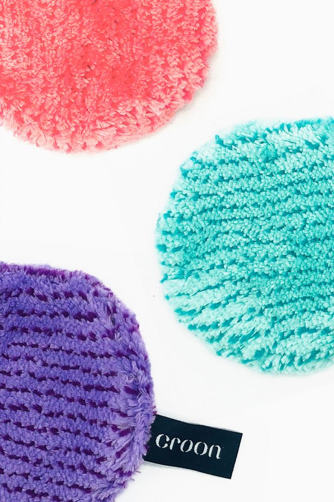 facial microfiber beauty products by croon in pink, teal, and purple